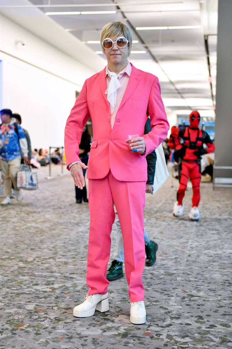 NEW YORK, NEW YORK - OCTOBER 14: A cosplayer dressed as Elton John Barbie poses New York Comic Con 2023 - Day 3 at Javits Center on October 14, 2023 in New York City. (Photo by Craig Barritt/Getty Images for ReedPop)