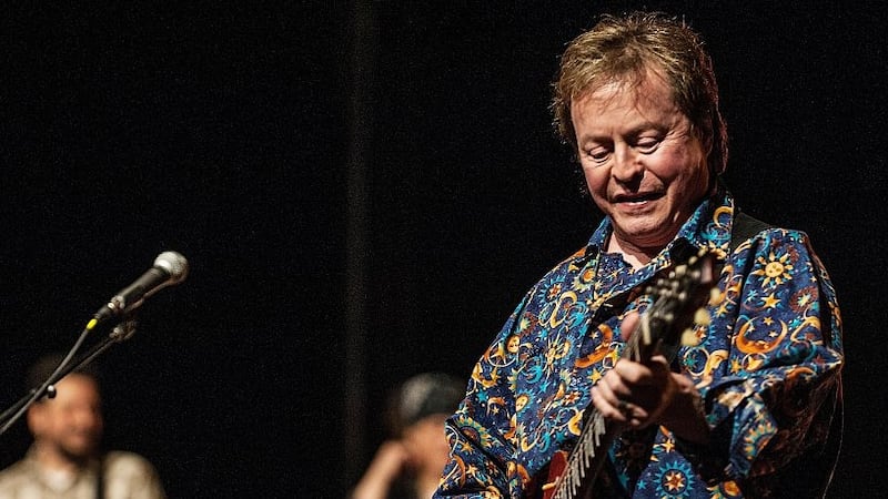 Rick Derringer playing guitar.