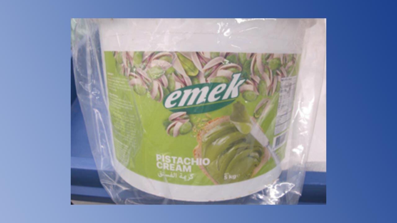 Container of pistachio cream.